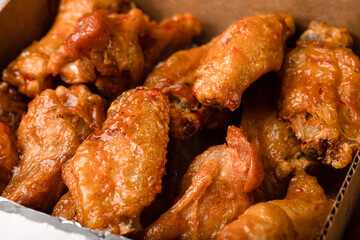 barbecue chicken wings, barbecue wings on a white background for takeaway