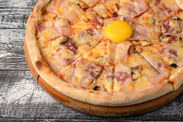 Pizza, hot pizza on a white wooden background, side and top view