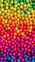 Colorful glossy candy balls background. Abstract background with colorful glossy gradient balls. Vector background