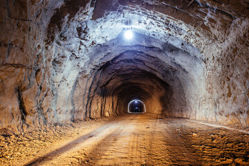 Old underground road tunnel inside mountain