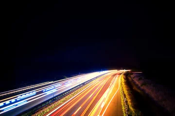 Foto op Plexiglas Langzeitbelichtung - Autobahn - Strasse - Traffic - Travel - Background - Line - Ecology - Highway - Night Traffic - Light Trails - High quality photo © Enrico Obergefäll