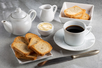 Healthy wholemeal toast with butter and coffee.