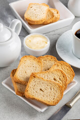 Healthy wholemeal toast with butter and coffee.