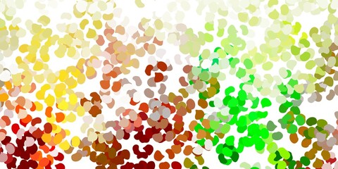 Light green, yellow vector backdrop with chaotic shapes.