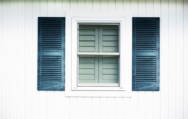 Fototapeta premium Elements of the facade of the house. window and shutters. Line minimalism.
