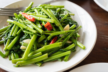 Fried morning glory light .Thai food. Pad pak boong is Thai traditional