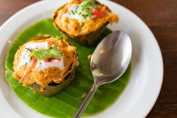 Thai Steamed Curried in Banana Leaf bowl. Thai call Homok.