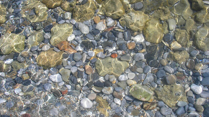 Stony seabed through clear water