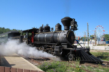 Fototapeta na wymiar Under Steam Again, Fort Edmonton Park, Edmonton, Alberta