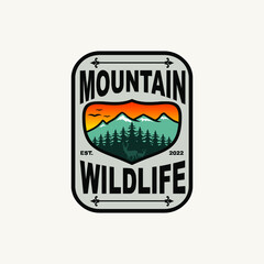 mountain wildlife badge logo design