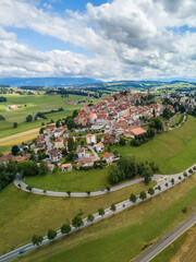 Fototapeta premium Aerial image of old Swiss town Romont, built on a rock prominence, in Canton Freibourg, Switzerland
