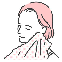 顔をタオルで拭いている若い女性
