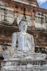 The old Buddha statue in Wat Yai Chai Mongkhon , a Buddhist temple in Ayutthaya Thailand. 
The monastery was constructed by King U-Thong in 1357 AD. 