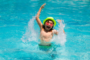 Excited amazed child in swimming pool. Healthy outdoor sport activity for children. Kids beach fun.