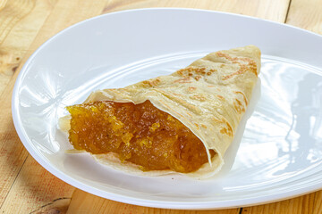 Delicous pancake with fruit jam