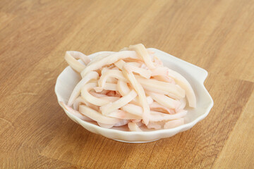Marinated squid strips in the bowl