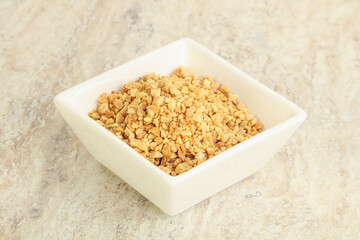 Crunched roasted peanut in the bowl