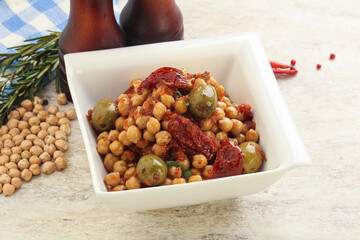 Chickpea beans with dry tomato and olives