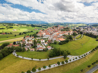 Fototapeta na wymiar Aerial image of old Swiss town Romont, built on a rock prominence, in Canton Freibourg, Switzerland