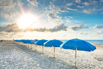 Hilton Head beach umbrellas at sunrise