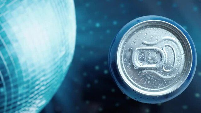 a man's hand takes a cold beer or a can of soda with drops of water. Drink drinks in aluminum cans with a latch. View from above. blue iridescent screen background