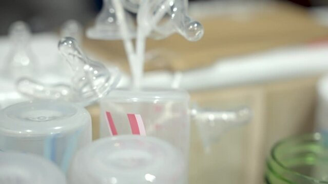 Cleaning and setting up breast pump.