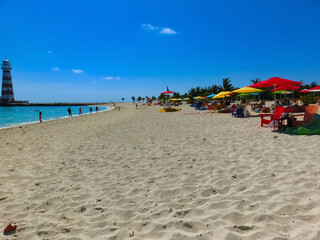 People resting at beach on Ocean Cay island