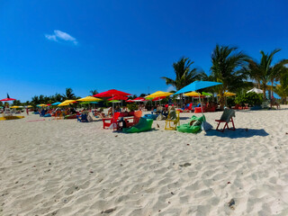 People resting at beach on Ocean Cay island