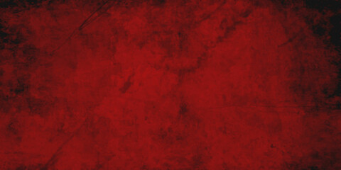 abstract red background or Christmas paper with bright center spotlight and black vignette border frame with vintage grunge background texture black paper layout design of light red graphic art