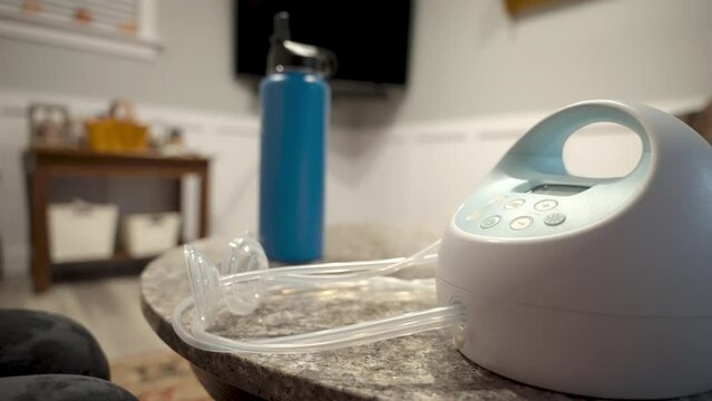 Cleaning and setting up breast pump.