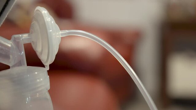 breast pump up close while pumping 