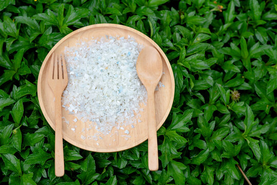 Plastic scraps or Micro Plastic in food dishes. Concept Micro plastic contaminates the food that people eat.