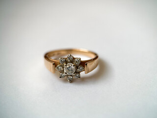 Gold diamond ring on a white isolated background. Red Gold Ring