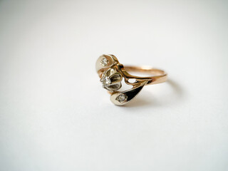 Gold diamond ring on a white isolated background. Red Gold Ring