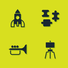 Set Rocket ship toy, Wood easel, Trumpet and Puzzle pieces icon. Vector