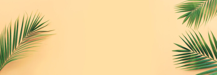 Image of tropical green palm over yellow pastel background