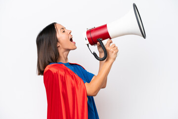 Super Hero caucasian woman isolated on white background shouting through a megaphone