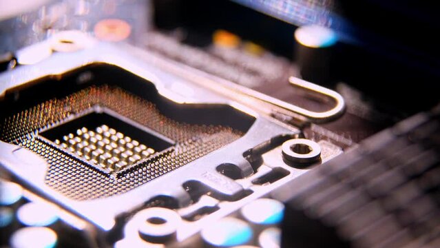 Detail of a CPU processor above its socket on the motherboard. computer motherboard with components. Highlighted element, circuits and electronic components. CPU. Digital communication