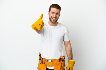 Young electrician man over isolated white wall with thumbs up because something good has happened