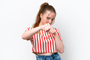 Young caucasian girl isolated on white background with fighting gesture