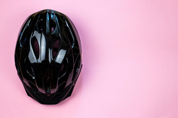 bicycle helmet on a pink background