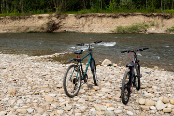 Fototapeta premium bicycles on the river bank