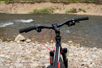Fototapeta na wymiar bicycles on the river bank