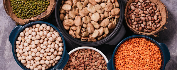 Various assortment of legumes beans, chickpeas, lentils, green peas. Healthy eating concept....