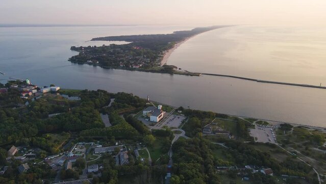 Aerial view of sea channel with Swedish fortress of Pillau citadel in Baltiysk, Kaliningrad region, Russia at sunset. 4k drone video. Travel destination