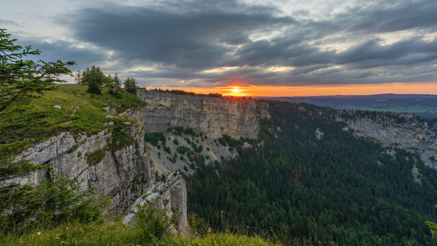 sunset in the jura mountains cliff