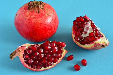 pomegranate fruit with red seeds isolated, close-up