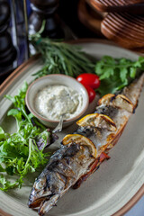 Baked stuffed grilled mackerel