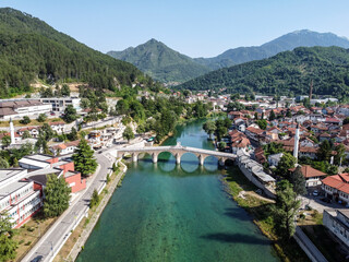 Konjic and river Neretva, Bosnia and Herzegovina, aerial drone view. Konjic is a city and municipality in BiH. Mountain Prenj in distance. 