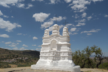 Vicar altar a sunny day with clouds, religious monument, Monda, Malaga, Spain - obrazy, fototapety, plakaty